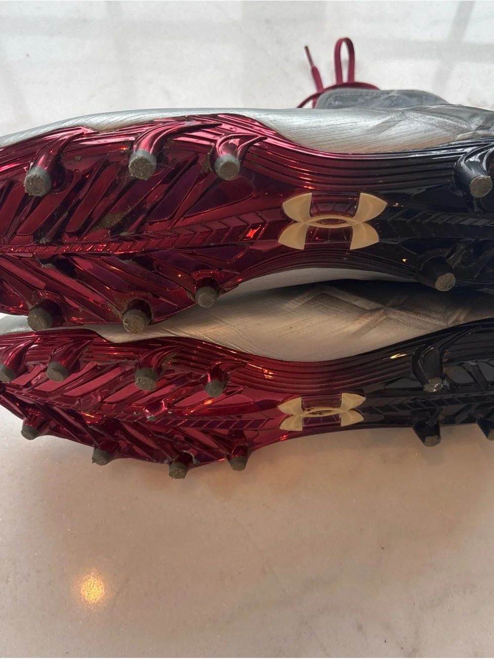 Under Armour Men’s Silver Athletic Cleats with Burgundy Accents